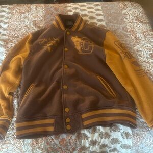 brown and gold crook varisty jacker